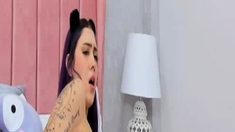 Purple Haired Woman Giving Her Best To Cum