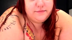 Big tit MILF does close up while dildoing her pussy