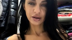 Busty curly brunette with big boobs fucks on couch
