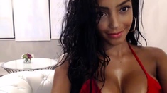 Busty curly brunette with big boobs fucks on couch